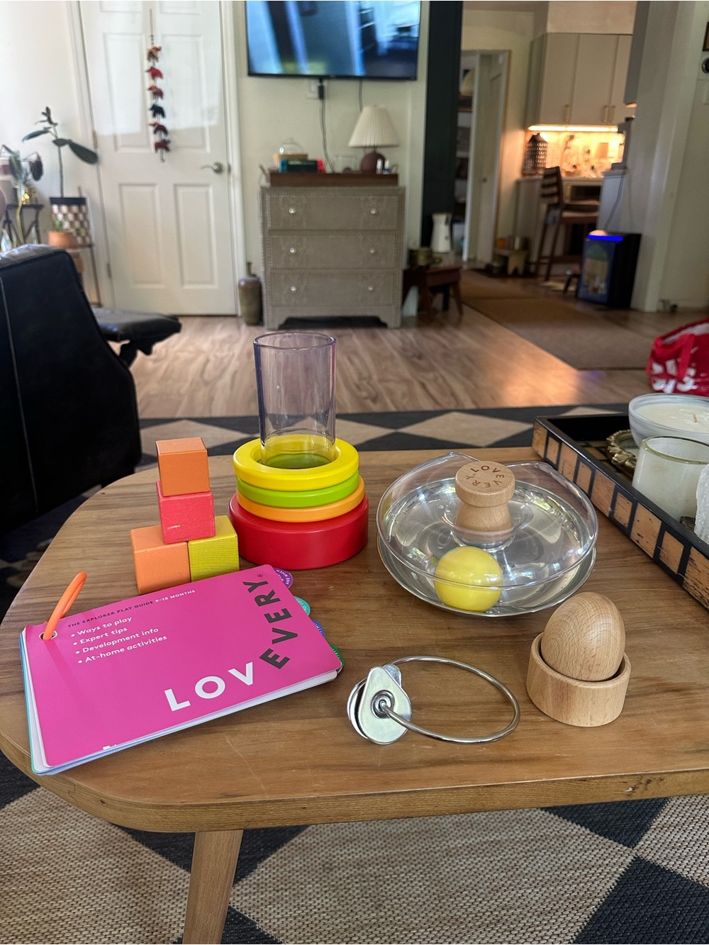 Lovevery toys 9-12 month guide,StackerSet blocks tip and turn toy keys egg cup